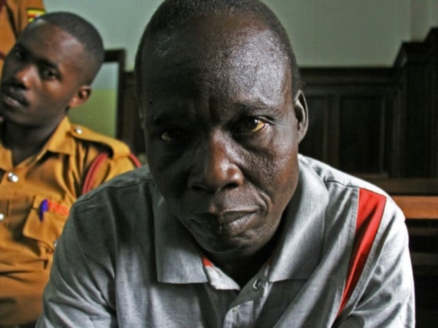 thomas kwoyelo pictured during a 2017 court hearing denies the charges against him gael grilhot photo afp